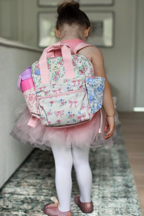 Itzy Ritzy Toddler Backpack - Daycare Bag - Features Adjustable Shoulder Straps, 2 Side Pockets & Spacious Interior with Wipeable Fabric Lining & Name Label, Ribbons & Roses Backpack